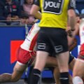 Kurt Donoghoe manages to stay on the field despite a high shot on James Tedesco.