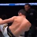 UFC welterweight champion Islam Makhachev scores with a brutal head kick against Ian Machado Garry.
