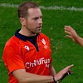 Aussie ref Angus Gardner is touched by Argentina player Tomas Albornoz.