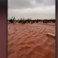 A couple has caught on camera risking their lives driving through floodwaters in Western Australia's north.