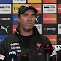 Essendon coach Brad Scott says he isn't afraid of being sacked but is confident the Bombers are trending in the right direction.