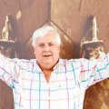 SMH. NEWS. BRISBANE. PALMER. Billionaire Clive Palmer at the Palmer Coolum Resort infront of a Titanic poster. Picture by Paul Harris. Thursday 26 July 2012