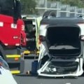 A stolen car packed with eight teenagers hit a Mercedes SUV causing it to flip on Melbourne's Monash Freeway.