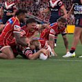 Lindsay Collins crashes over three Dolphins defenders to score a try and push the Roosters one step closer to a spot in the grand final.