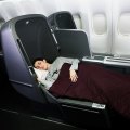 The new system will give flyers who book an economy class award a shot at an upgrade to business class' upgraded seating.