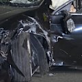 A driver has smashed into two parked cars in western Sydney, before making a run for it.