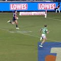 Roosters star Hugo Savala palms off defenders to go all the way down the sideline and score.