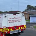 A man has been charged with murder after a body was found outside a burning house in Glenmore Park, Sydney, yesterday.