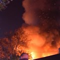 Police are hunting unknown suspects over a major factory fire in Melbourne overnight.
