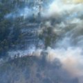 A bushfire burning near Plainland in the Lockyer Valley caused mayhem for motorists on the Warrego Highway.