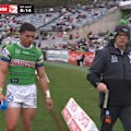Raiders winger Savelio Tamale is dragged off by coach Ricky Stuart after letting in a try against the Dragons.