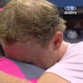 Star sobs on fellow American’s shoulder