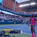 Frances Tiafoe saves set point in a wild rally at the US Open.