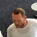 An escaped prisoner who fled custody after attending a funeral in Melbourne’s north-west could be in hiding somewhere in the city, police said.