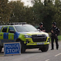 The five UK men arrested on suspicion of planning a terror attack on a RAF base have been released on bail.