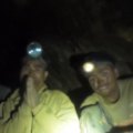 Five people who were trapped in a flooded Laos cave for eight days have been rescued.