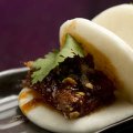 A pair of pork belly bao.