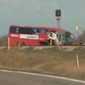 A woman has died and 13 people are in hospital after a bus crashed on a notorious stretch of the Bruce Highway in Queensland.
