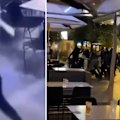 Diners at an Oakleigh shopping precinct ran for their lives when a gang of masked youths stormed a cafe before an 18-year-old man was stabbed with a machete.
