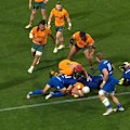 Josh Canham drives over to complete an unlikely hat-trick of tries.
He is the first Wallabies lock to achieve the feat.