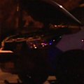 A driver accused of evading police minutes before a deadly crash killed a mother has fronted court from his hospital bed.