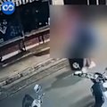 Footage appears to show the 26-year-old suspect wheeling a suitcase through central Athens before police say it was dumped inside a derelict building.
