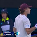 Alex de Minaur claims a break point after a marathon rally. 