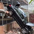 Witnesses filmed as a driver was carjacked in broad daylight in a dramatic spree in Brisbane.