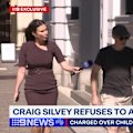 Australian author Craig Silvey has been filmed reporting to police as part of his bail conditions.