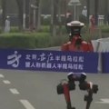 A robot runs a half-marathon in 50 minutes and 26 seconds in Beijing.