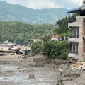 Hundreds of people are missing and at least eight have been killed after an avalanche of ice and rock triggered massive flash floods that swept through parts of Nepal.