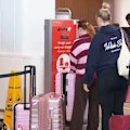 Jetstar is overhauling its baggage charges to institute a fee for anything stored in an overhead compartment.