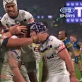 Cameron Munster punches the Storm further in front as he topples over the tryline.