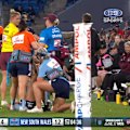 Jaime Chapman lies on the sideline with a leg injury.
