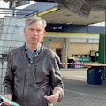 This Kyiv petrol station was struck by a Russian drone. It's still open for business.