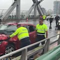 An allegedly stolen car has crashed and caused traffic chaos at the Story Bridge.