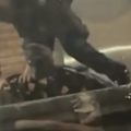 NSW Police have defended the actions of one of their officers who was filmed by onlookers repeatedly punching a man who he had pinned at the ground at a Sydney train station.
