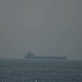 The US has launched fresh strikes against Iran in retaliation for its attack on a commercial ship in the Strait of Hormuz.