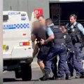 A man was arrested in Ballina after allegedly assaulting an officer, with police seizing a knife and saw.