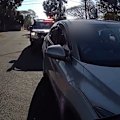 A Queensland driver was slapped with a hefty fine for allegedly steering with his knees while buttering a bagel.