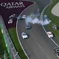 At least 10 cars were caught up in a pile-up before the field reached turn two.