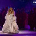 Mariah Carey ignites the opening ceremony with a stunning performance sung in Italian.