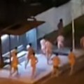 A group of naked runners offered a surprise show for diners on Gold Coast's Main Beach overnight.