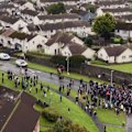 Around 2,000 protesters blocked the way into a Catholic area in a Northern Irish town that a Protestant parade was due to walk down on Sunday morning (September 27) after the lifting of an almost 30-year ban on a route that was a flashpoint of sectarian disputes.