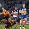 Latu Fainu is sent to the sin bin for a dangerous tackle on Leo Thompson.