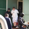 A man has been arrested over an alleged sexual assault of a woman in a park in Homebush, Sydney.