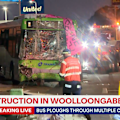 A bus has crashed in Woollongabba, leaving a trail of destruction.