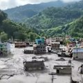 The death toll from catastrophic flash flooding in Nepal and Tibet has risen to 469 as thousands more remain unaccounted for.