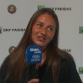 Ukraine's Marta Kostyuk chats to Chris Stubbs after reaching the French Open semi-finals.