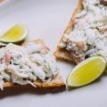 Mud crab with fresh herbs on toast.